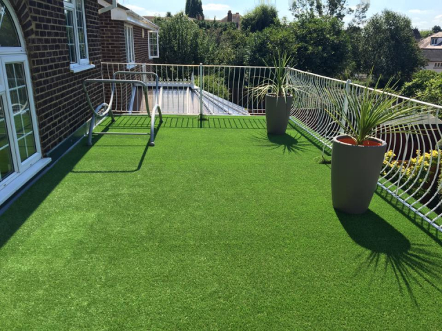 artificial grass installed on a balcony and rooftop