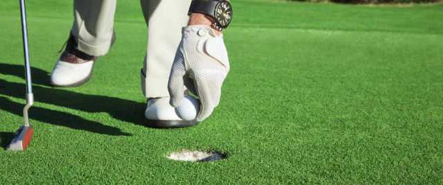 Artificial grass golf course fake grass putting green man playing golf on an artificial grass putting green and fake grass golf course